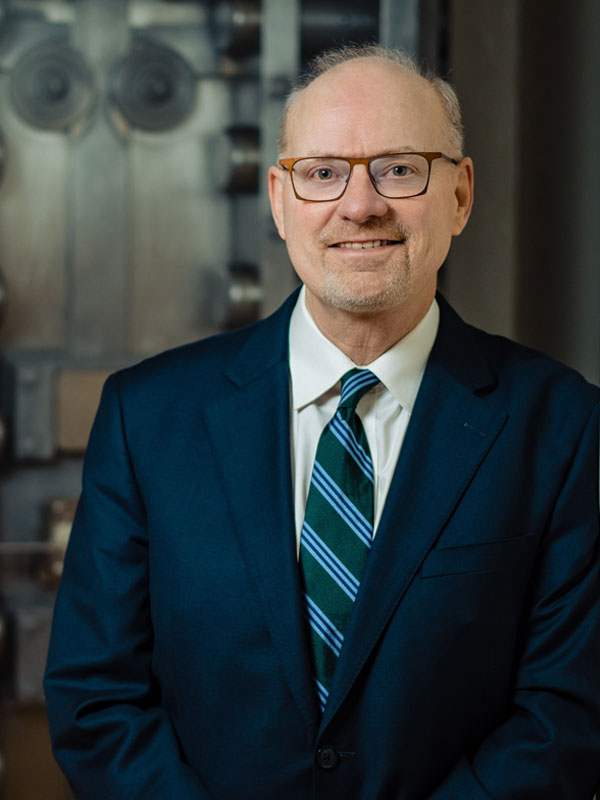 Headshot of former judge Timothy Bradshaw